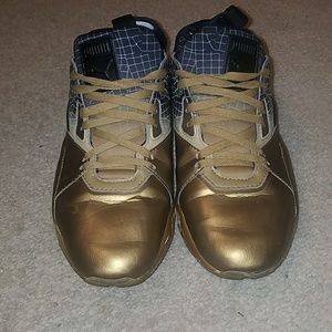 Gold/Black Pumas